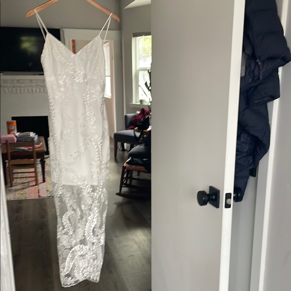 Elliatt Cream Spaghetti Strap Backless Sundress